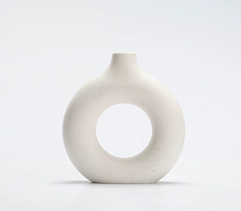 Three-piece ceramic vase set with matte white finish for interiors