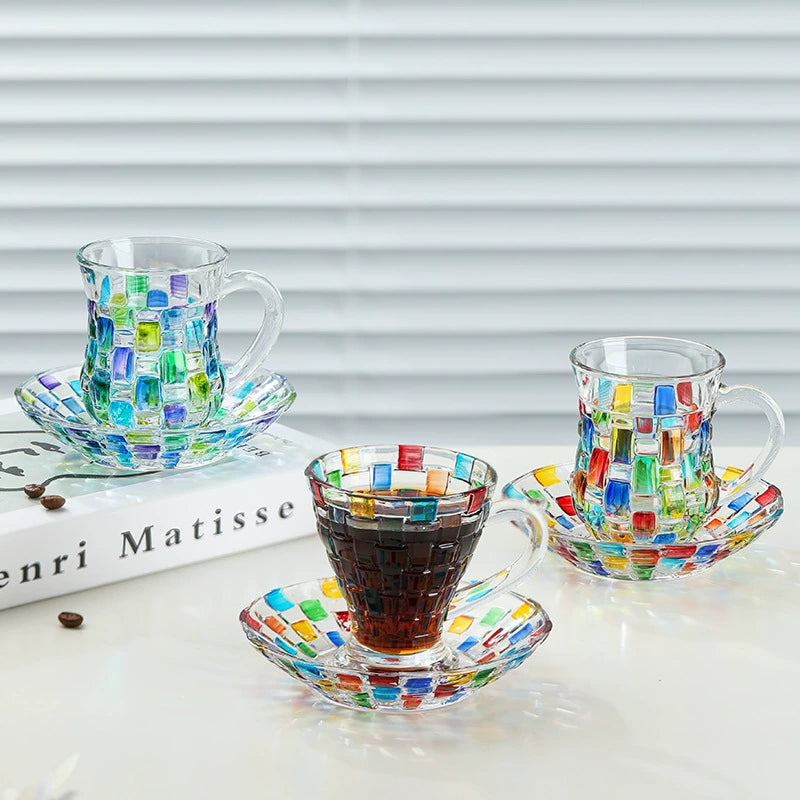 Artisan-crafted glass tea cup set with elegant curved design
