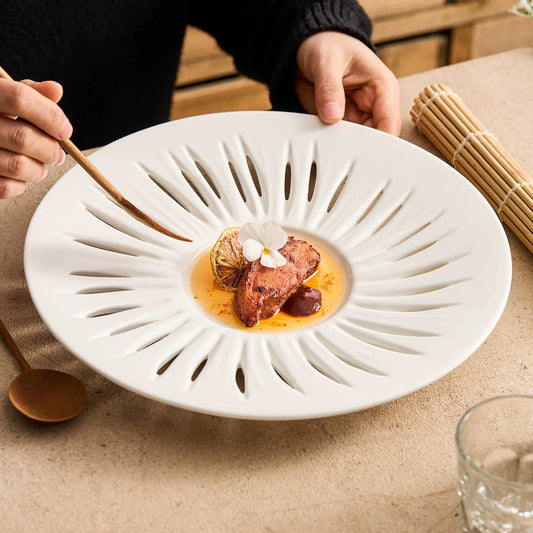Artisanal high-fired 1350°C durable ceramic plate with hand-refined hollow borders.