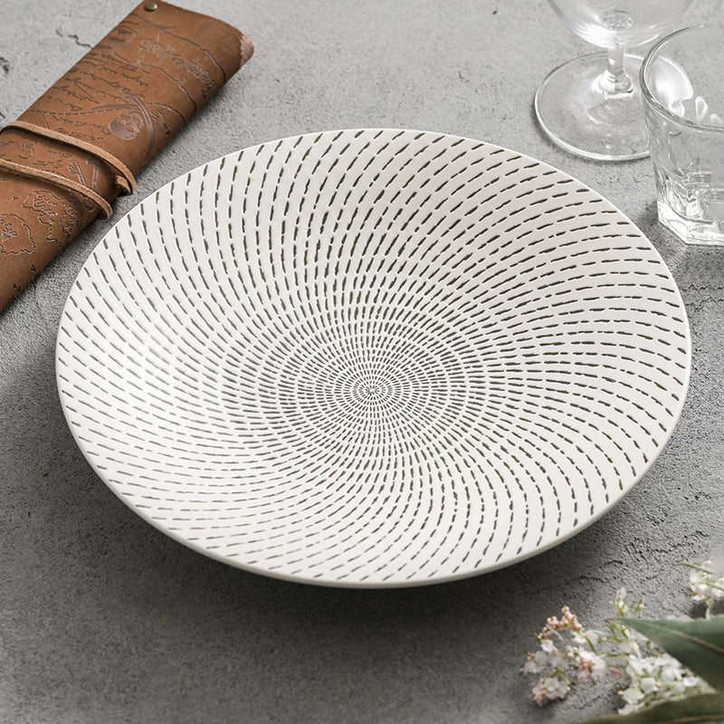 Artistic presentation on meteor-inspired ceramic plate