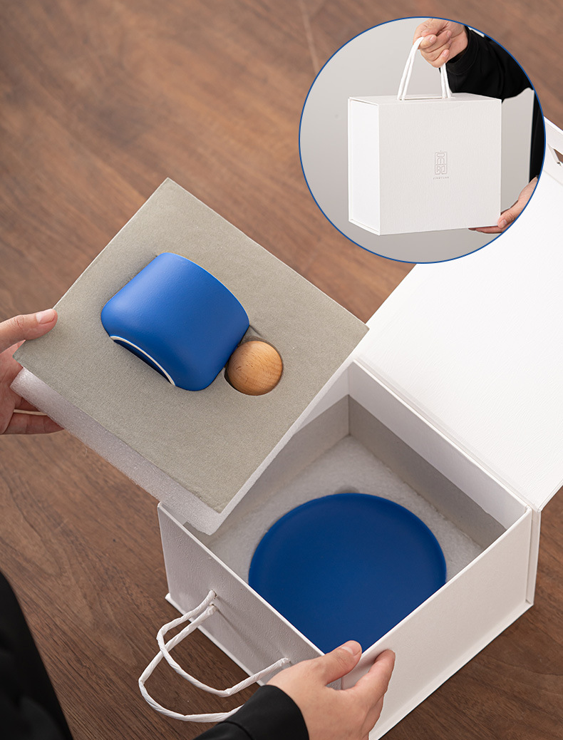 Bold orange coffee mug with matching saucer