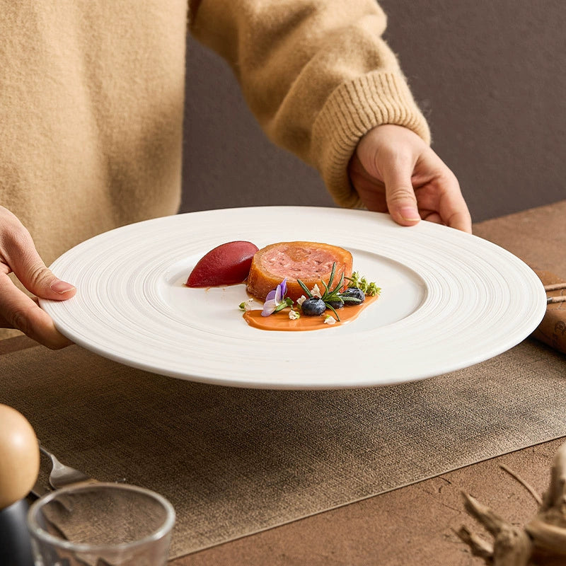 Brushed ceramic dinner plate with minimalist design