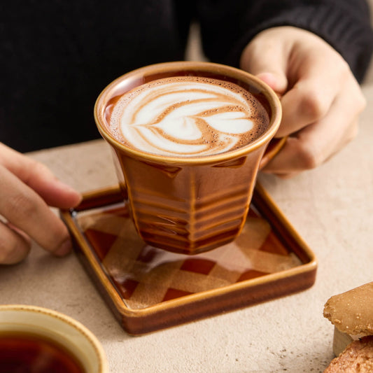 Caramel beige ceramic cup and saucer set for cappuccino