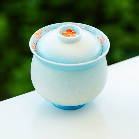 Ceramic tea gaiwan with symbolic rounded design