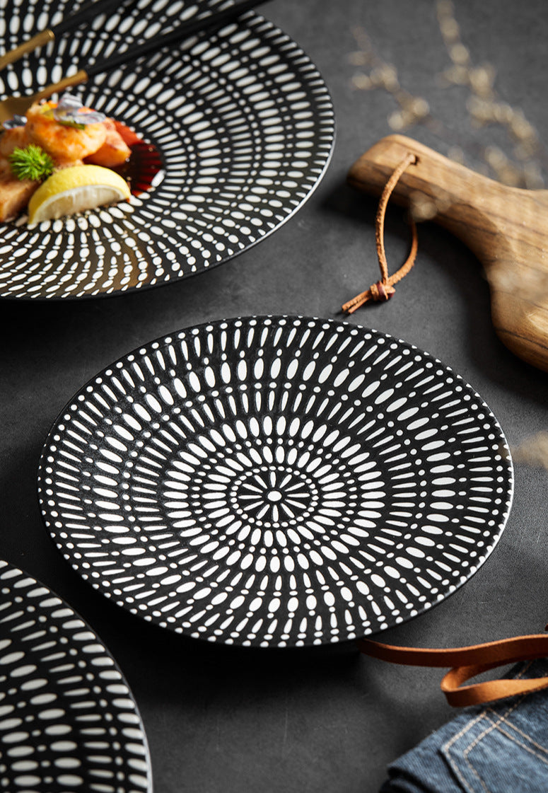 Close-up of large 31.5cm ceramic dinner plate with minimalist design
