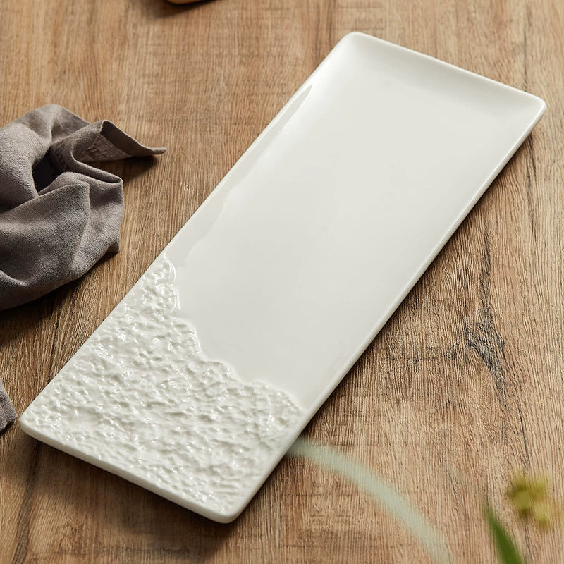 Close-up of stone-like edge on rectangular plate