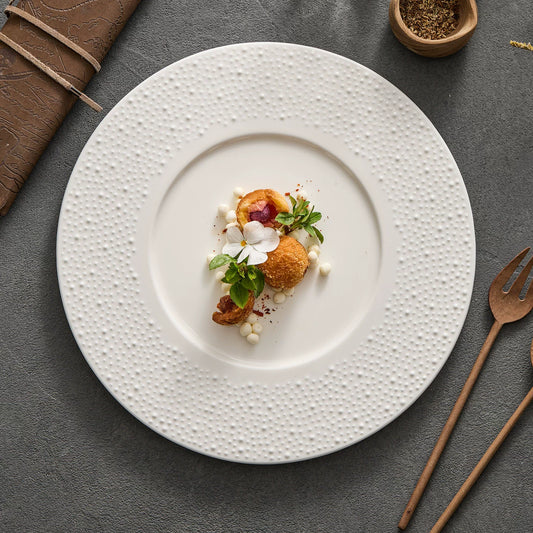 Close-up of the micro-textured ceramic surface on a GOSEUNG sesame point dinner plate.