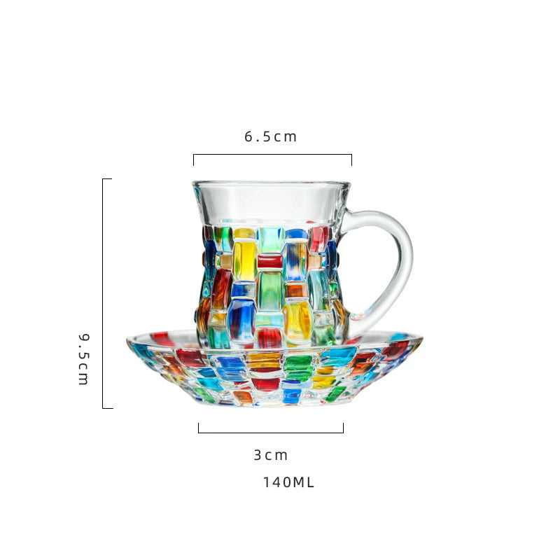 Colorful mosaic-patterned glass teacup and saucer set