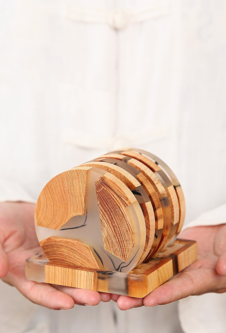Durable resin and wood coasters protecting tabletop