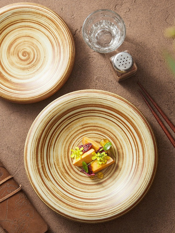 Earth-toned ceramic plate with hand-pulled grooves
