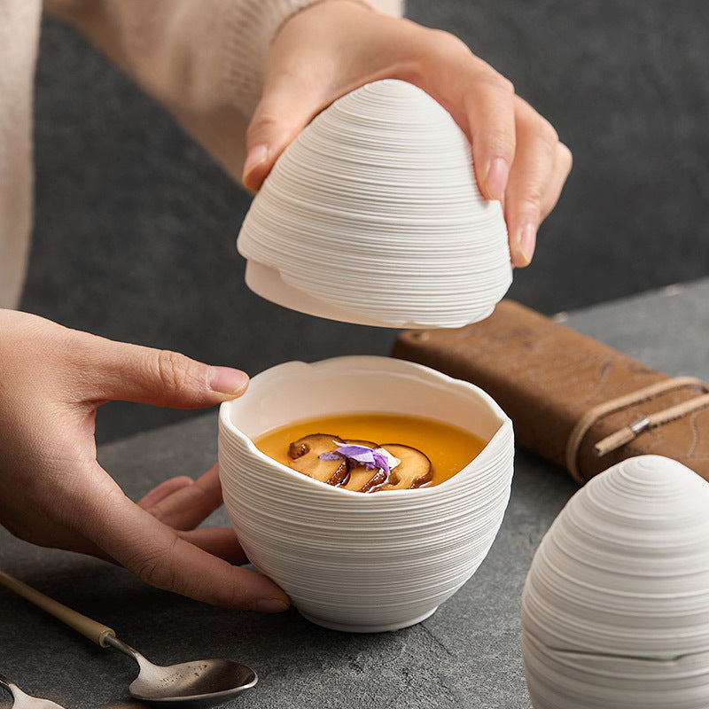 Egg-shaped ceramic bowl with lid for steamed egg dishes