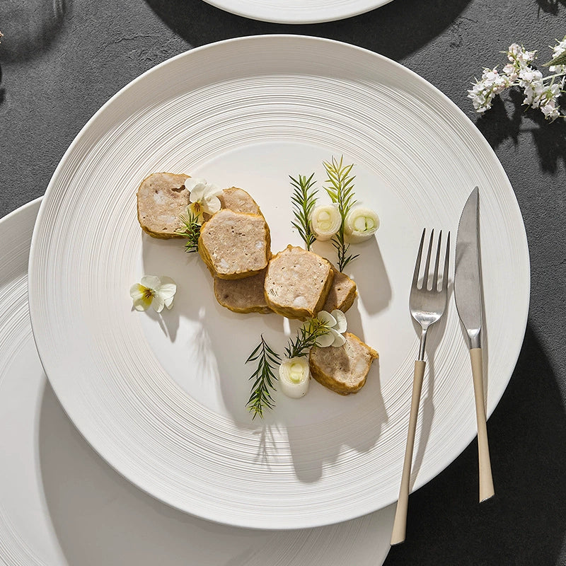 Elegant ceramic dish with subtle textured rings