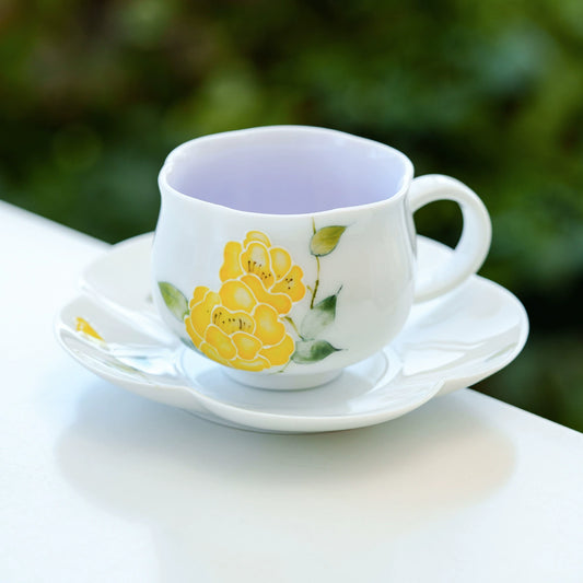 Elegant ceramic floral cup with golden peony design