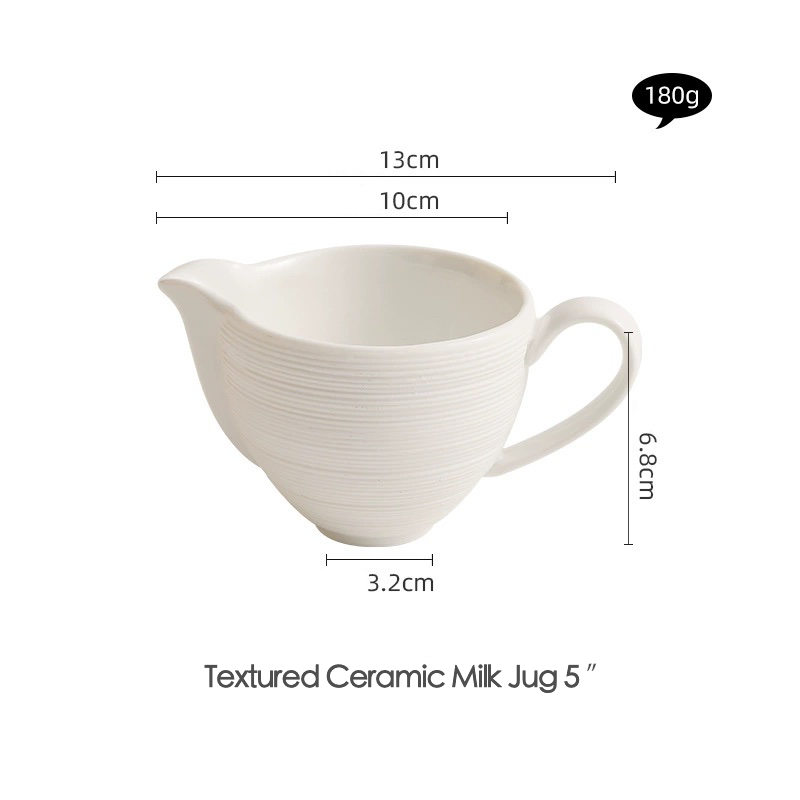 Elegant white milk cup with ergonomic handle