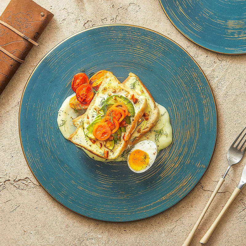 Flat round ceramic plate for food presentation