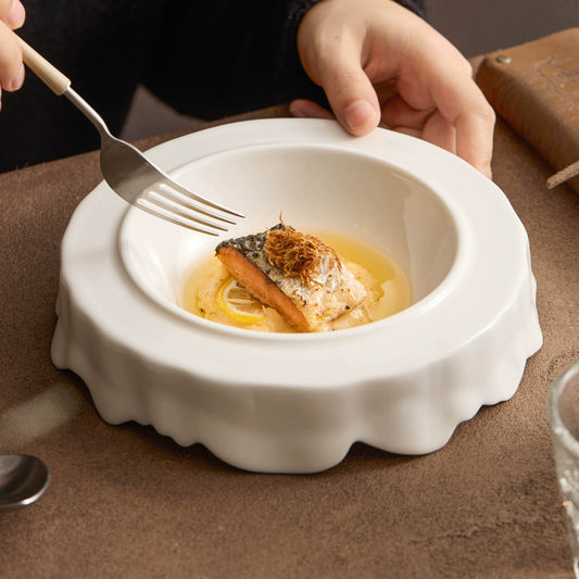 GOSEUNG Cloudform plate featuring organic hand-shaped rim.