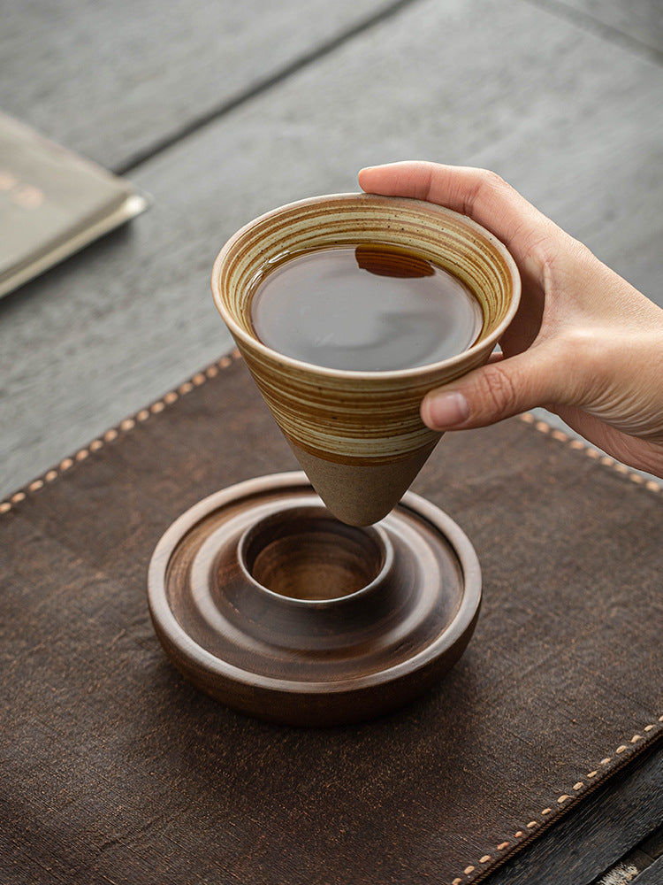 Hand-thrown ceramic mug set with wooden base for modern tea or coffee rituals