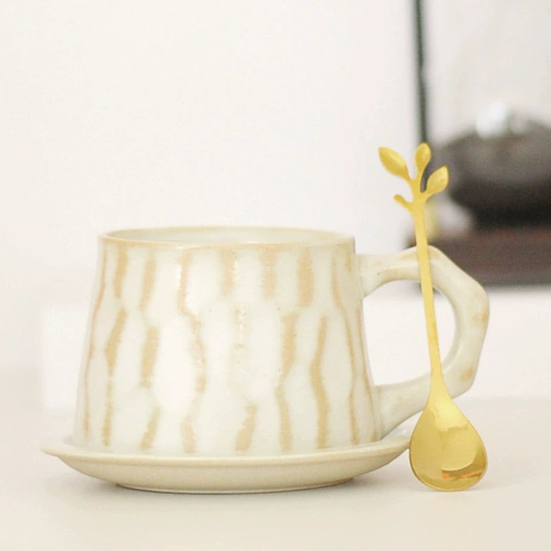 Handcrafted ceramic cup and saucer for office coffee break