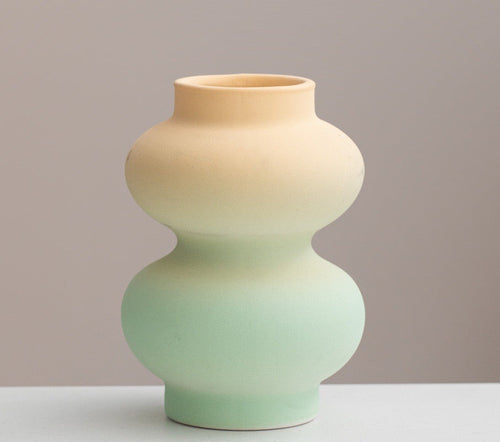 Handmade ceramic vase with geometric matte silhouette