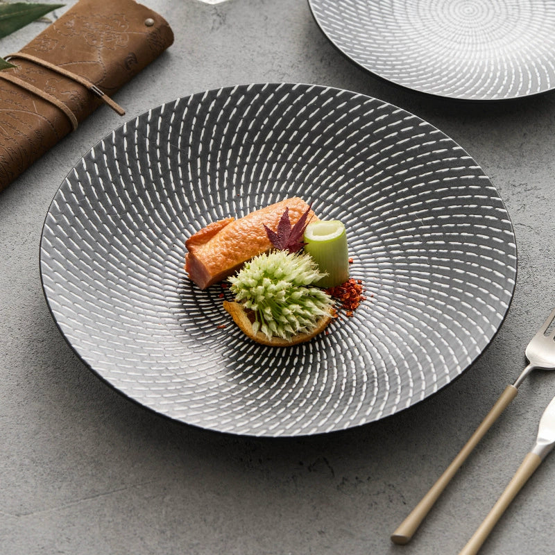 High-end ceramic plate with speckled glaze design