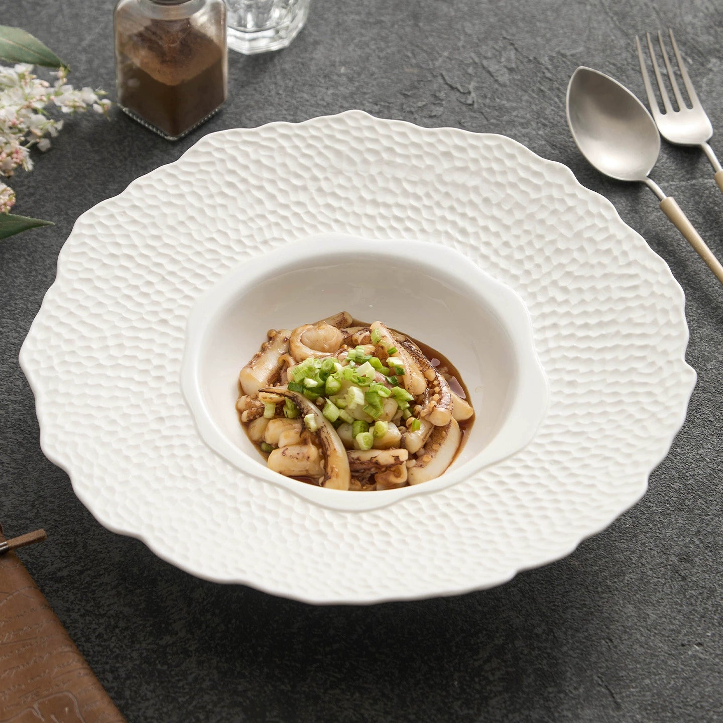 High-end textured dinner plate with floral-inspired contour