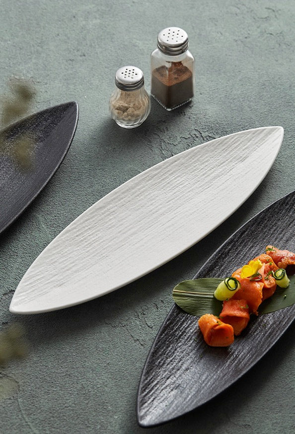 Ivory and black ceramic plates with handcrafted look