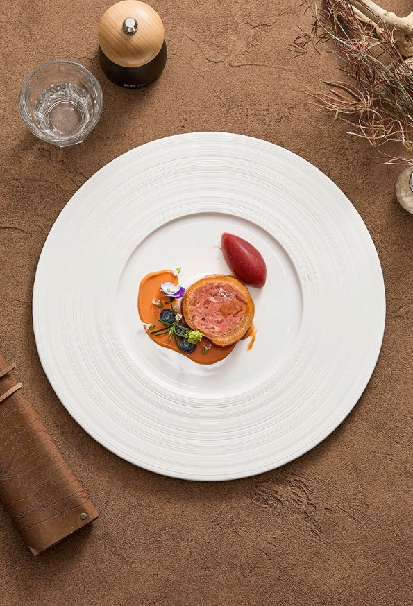 Minimalist ceramic dish with wide frame and matte finish