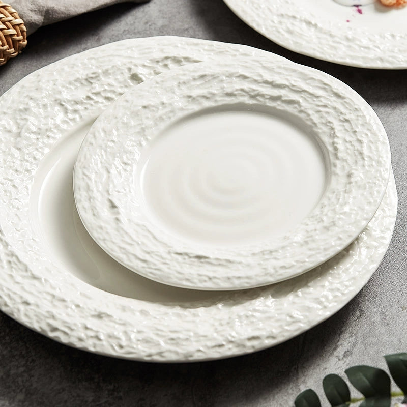 Minimalist plate with hand-finished stone texture design