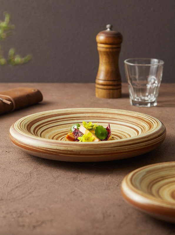 Minimalist plate with textured swirl for modern dining