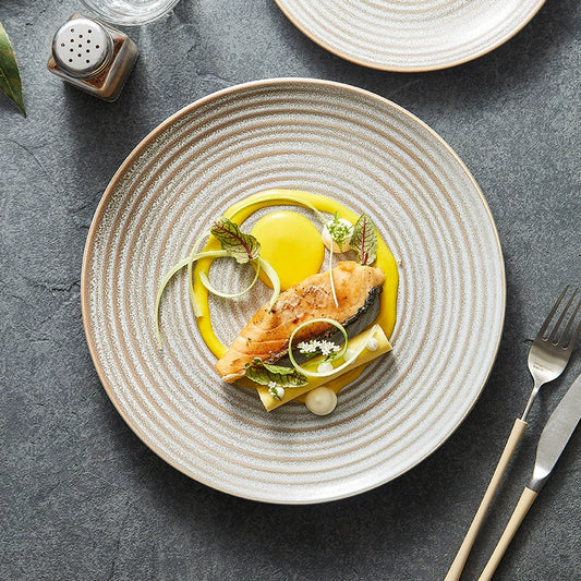 Minimalist stoneware plate in sand-gray matte finish