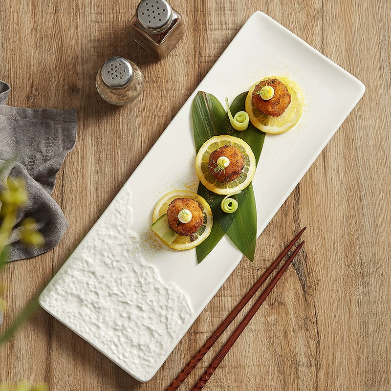 Minimalist white ceramic plate with organic texture