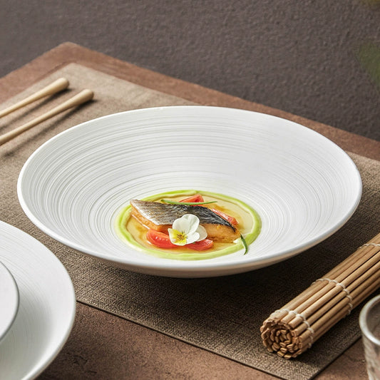 Modern ceramic serving bowl with sculptural wide rim