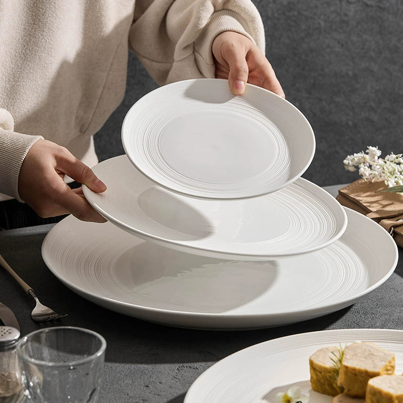 Modern round ceramic plate with linear design