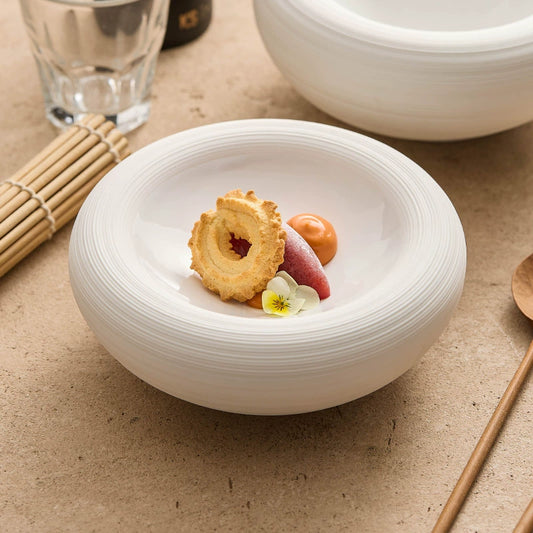 Modern white deep plate with recessed center for Western-style dishes