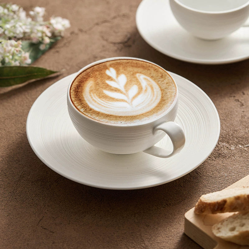 Porcelain coffee cup and saucer with spiral texture