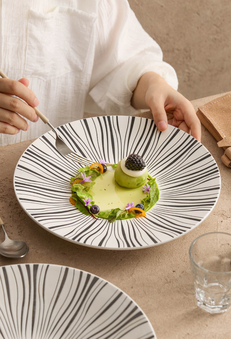 Restaurant-style dinner plate with bold pattern