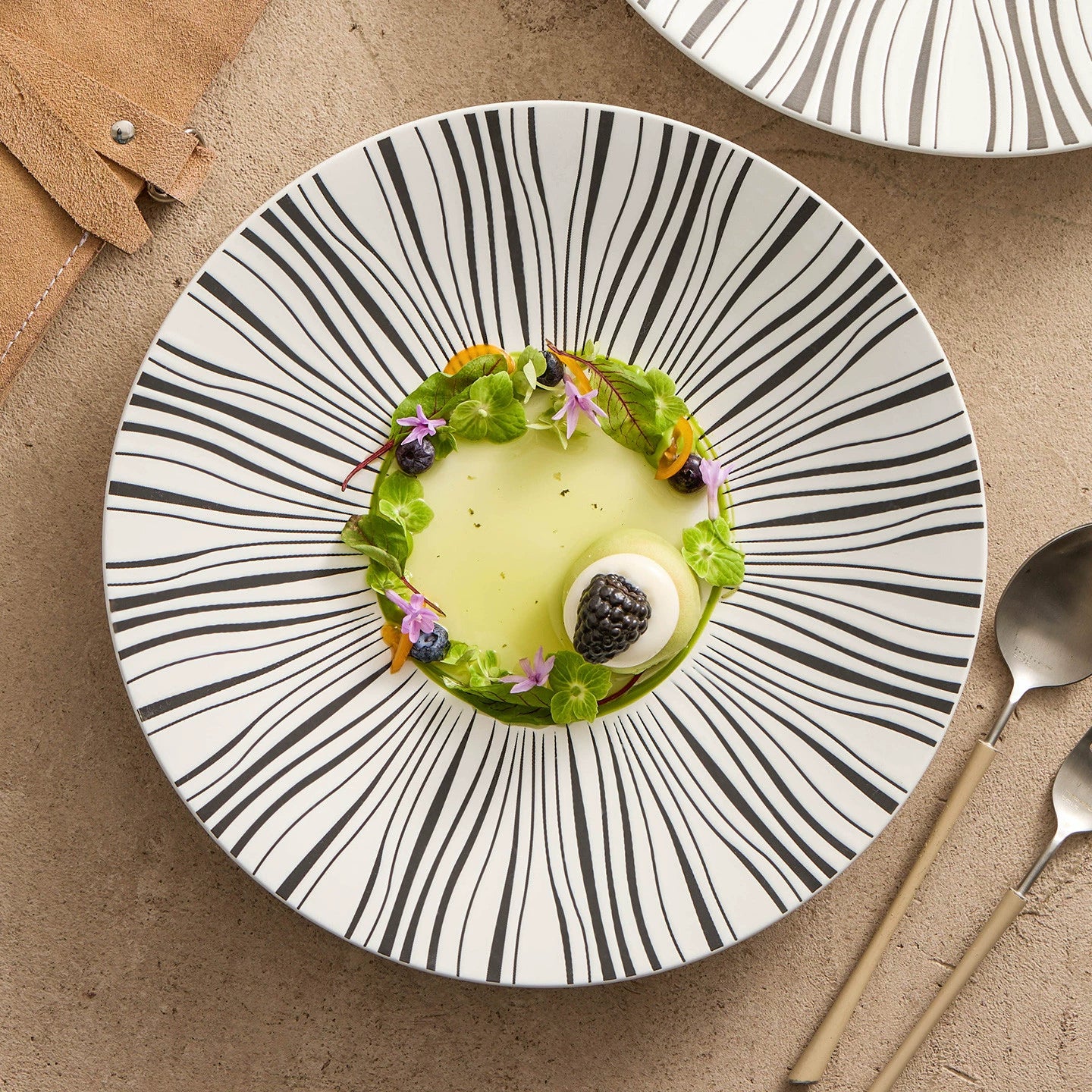 Shallow white ceramic plate for gourmet presentation