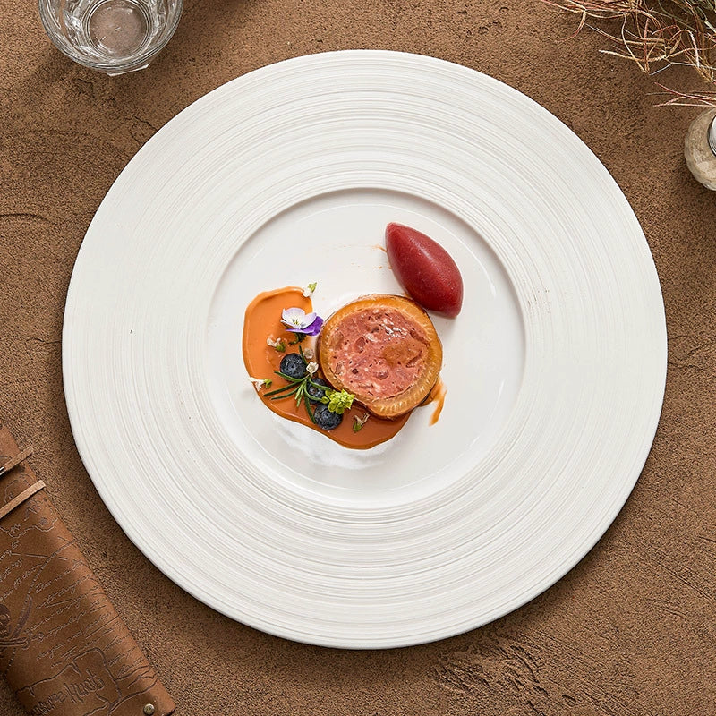 Shallow white plate for fine dining or plated desserts