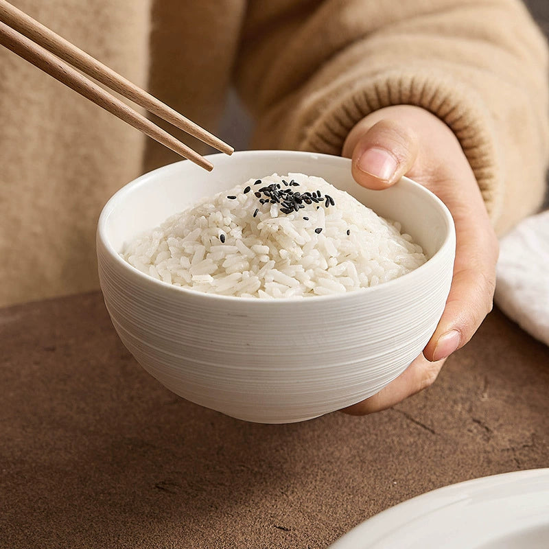 Small ceramic bowl with matte white finish