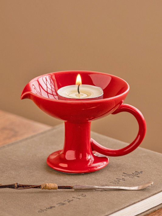 Small ceramic pedestal candle holder for romantic dinner setting