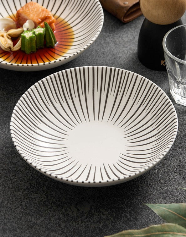 Stylish deep plate on dark stone table surface