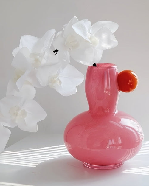 Whimsical artistic glass vase with playful bubble design