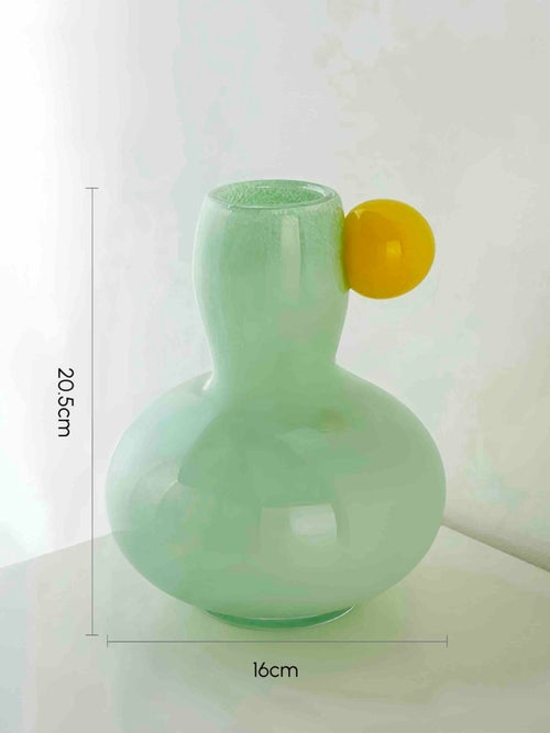 Whimsical home accent vase ideal for flowers or standalone display