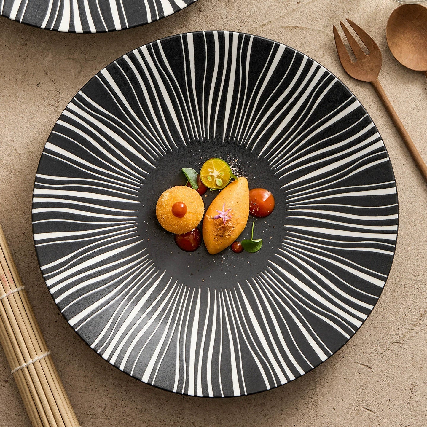 White ceramic dinner plate with burst stripe design