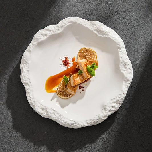 White irregular edge ceramic dinner plate with food plating