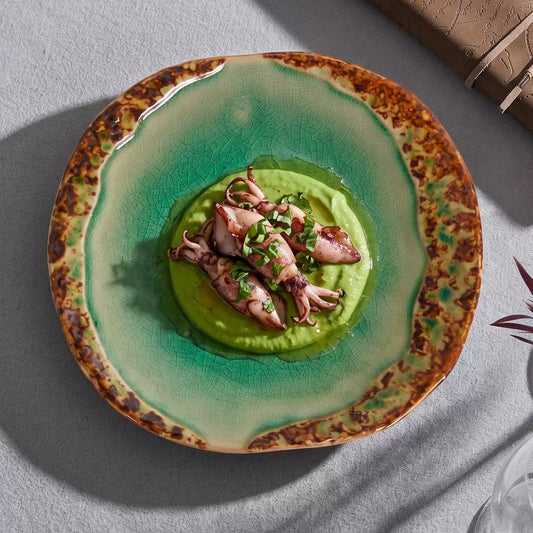 jade green artisanal dish with organic asymmetric silhouette