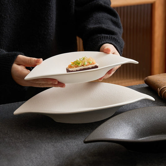 white leaf shaped stoneware bowl for tapas and amuse bouche