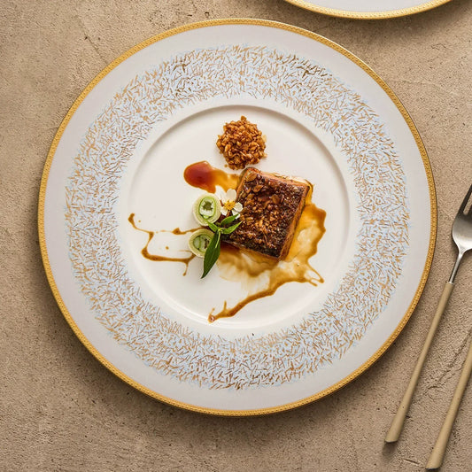 The Artistry Behind Our Hand-Painted Sky-Blue Wide-Rim Porcelain Plate