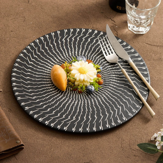 Radiant Design for Creative Dining: Black Ceramic Plate with Radiating Pattern