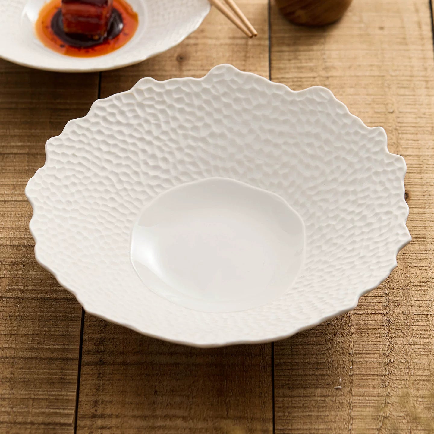 7.5-inch textured ceramic bowl with 235ml capacity for appetizers.